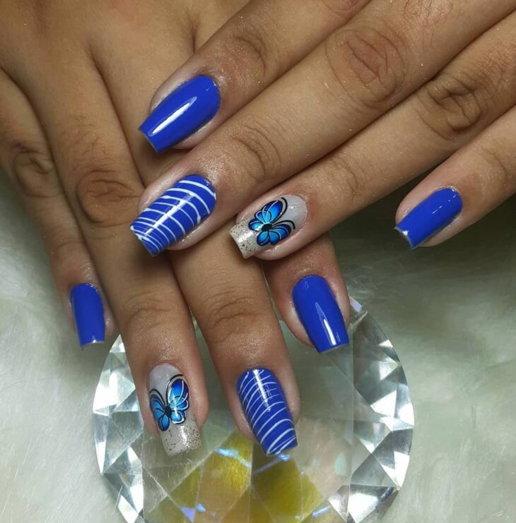 unhas decoradas azul 93