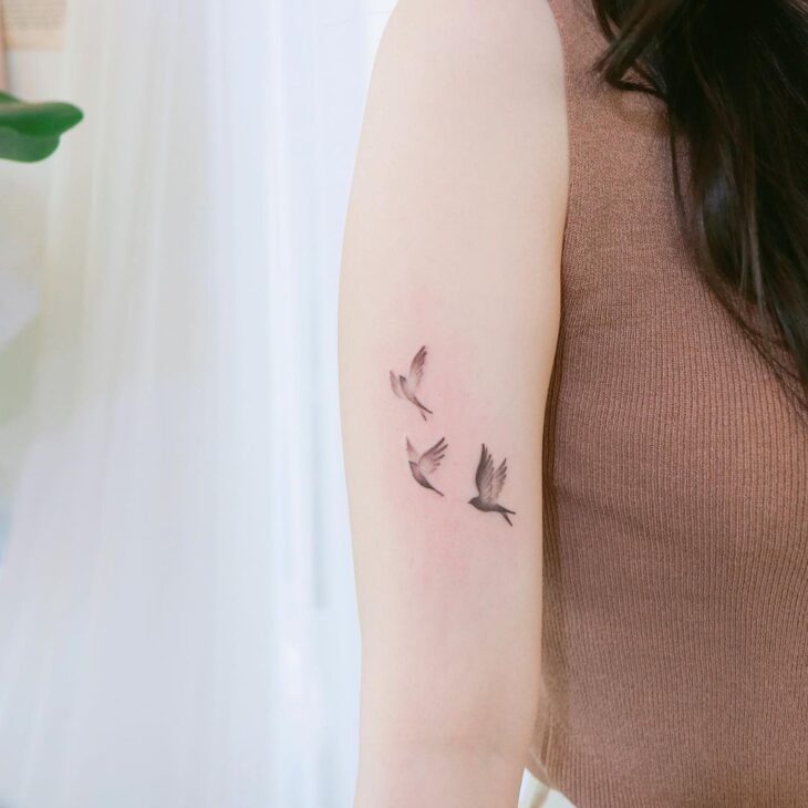 Tatuagem de pássaros 69