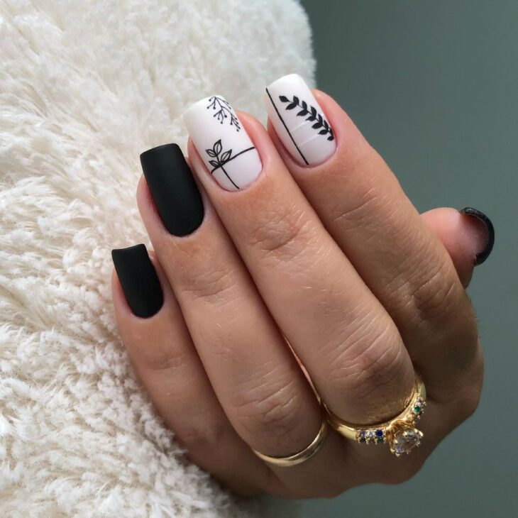 unhas decoradas em preto e branco 75