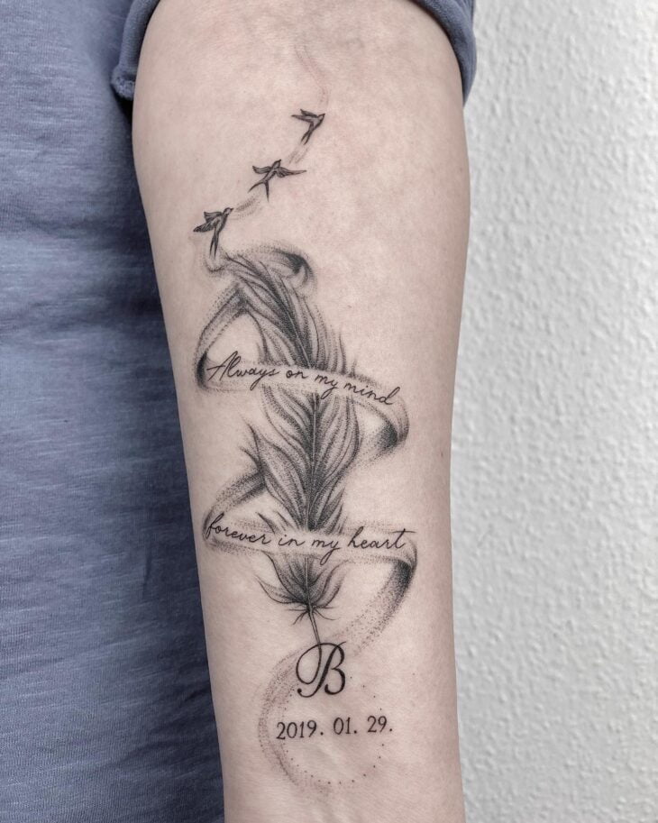 tatuagem feminina no braço 305