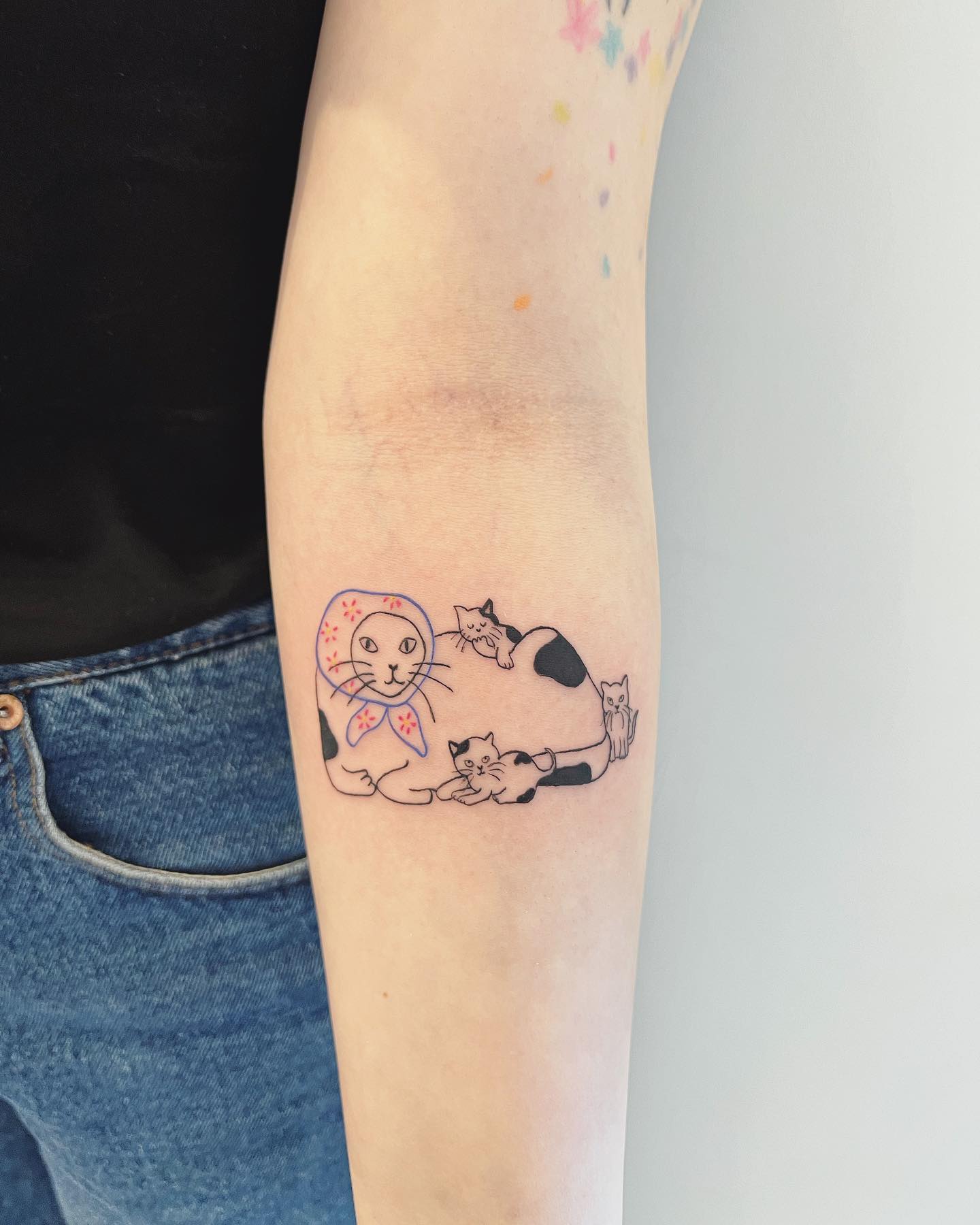 tatuagem feminina de gato