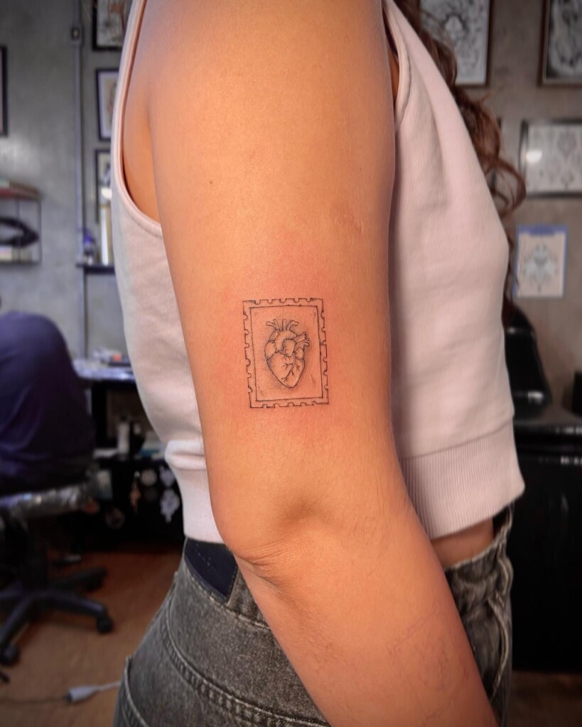 tatuagem feminina selo