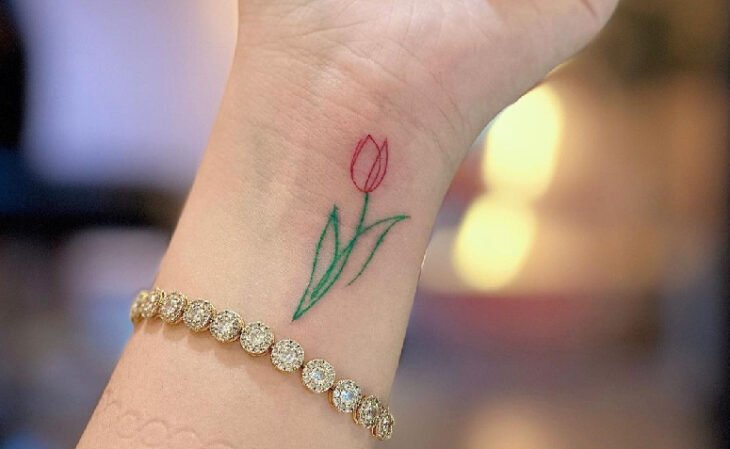 tatuagem feminina no braço 55
