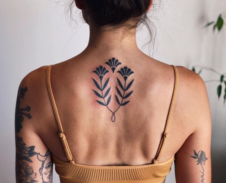 tatuagem nas costas feminina 116